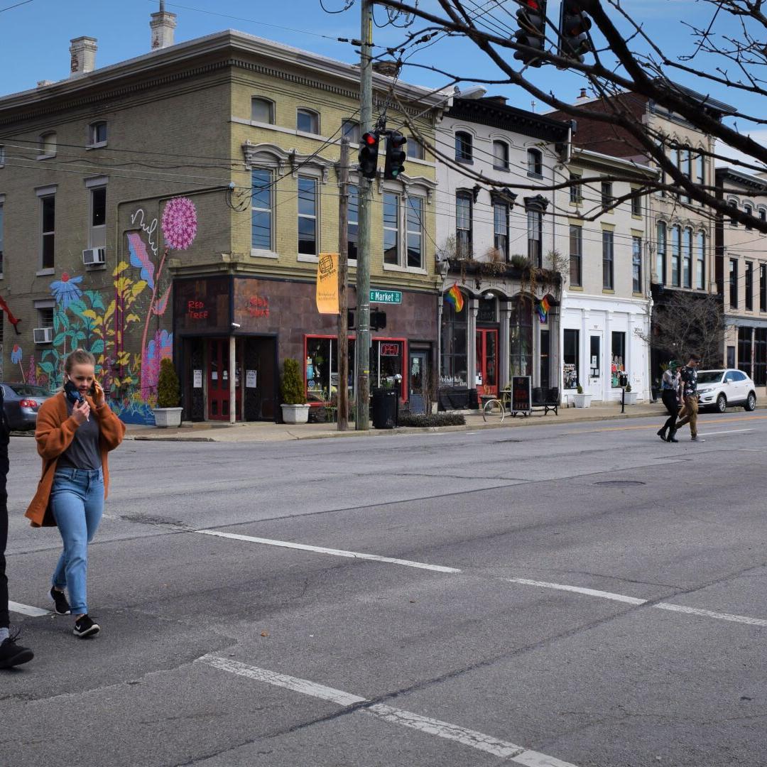 nulu area generic people crossing street